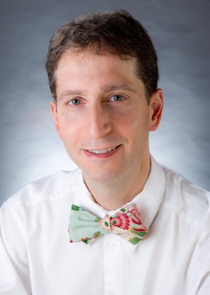 Снизить давление болит голова