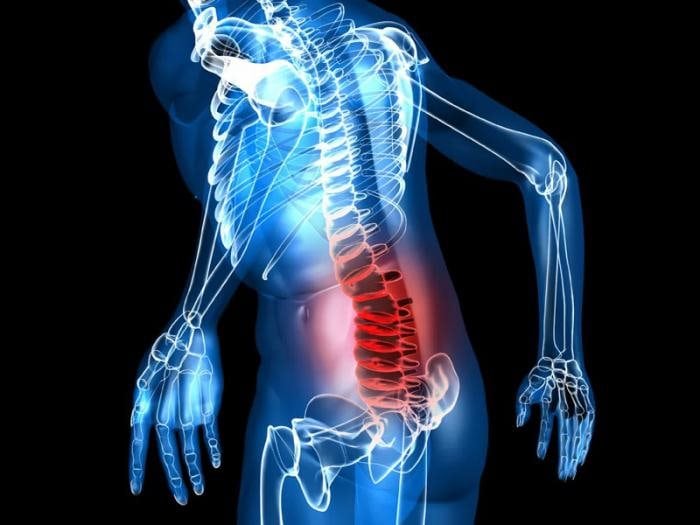 Почему при цистите болит спина